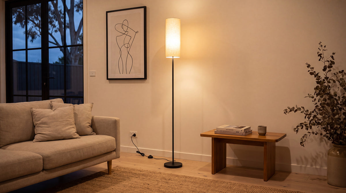 Styling a black floor lamp: the line by day, the glow by night