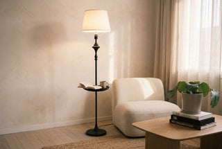Slate Tray floor lamp with a built-in table beside a boucle reading chair in a NZ lounge, an open book and a mug on the tray