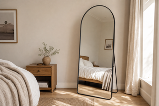 Single silver vs double silver vs low iron mirror glass NZ — Titan Arched mirror in a bedroom