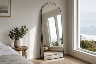 What is mirror silvering — Titan Arched mirror in a coastal NZ bedroom