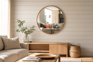 Round vs oval mirror NZ — Aure round oak wall mirror in a Kiwi living room above a low oak console