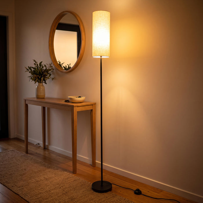 Chandelle Linen Column Floor Lamp adding warm welcoming light to a stylish entryway