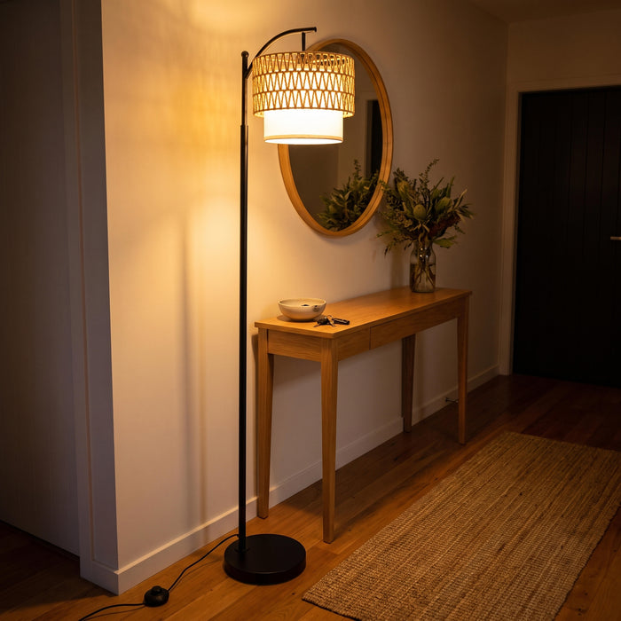 Rousseau Rattan Weave Floor Lamp adding warmth to a stylish entryway by the front door