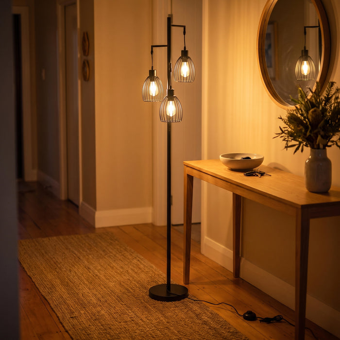Voltaire 3-Light Cage Floor Lamp brightening a welcoming entryway beside the front door