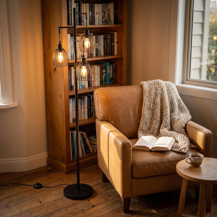 Voltaire 3-Light Cage Floor Lamp lighting a quiet reading corner beside an armchair
